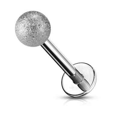 Połyskujący labret.