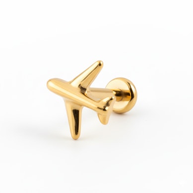 Tytanowy labret z samolotem