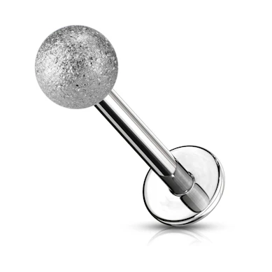 Połyskujący labret.