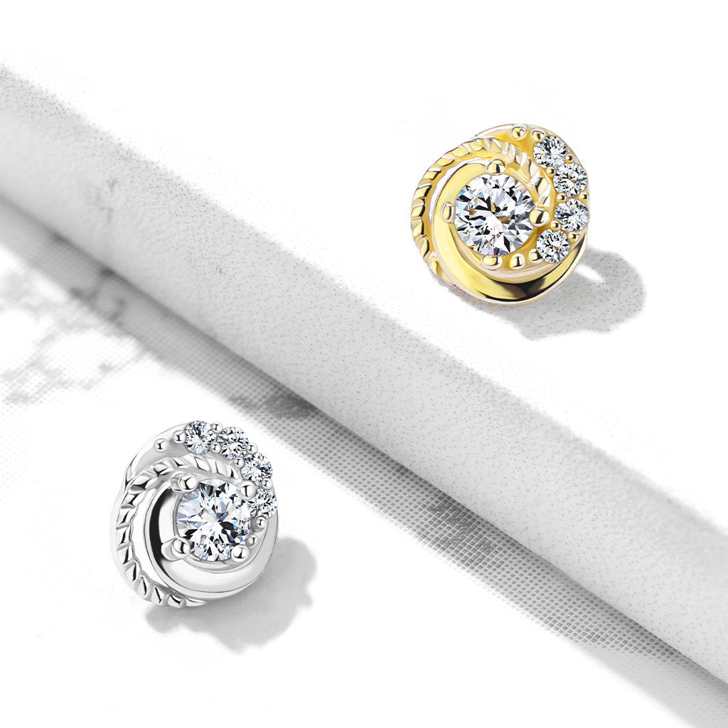 Dermal z 14 karatowego złota z plecionym motywem i kamieniami