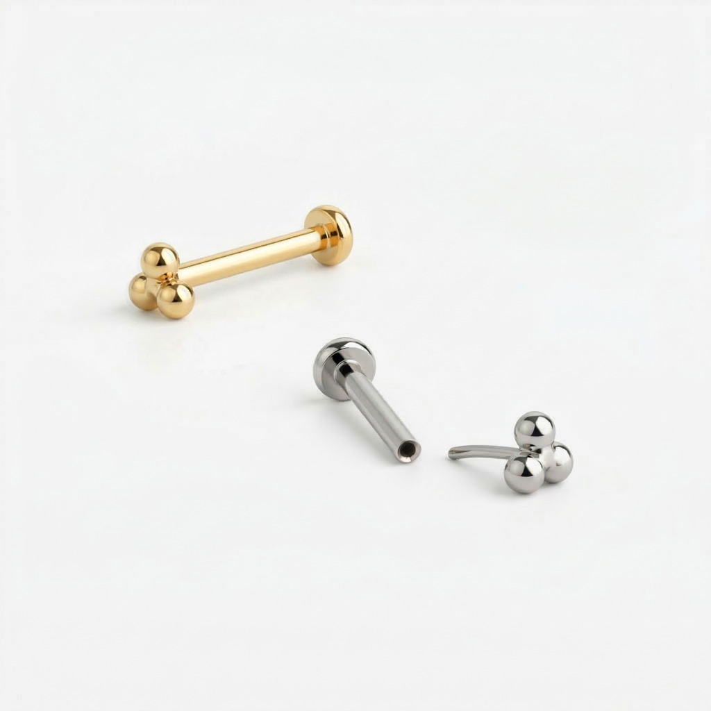 Wpychany labret z tytanu z trójkątną kulką