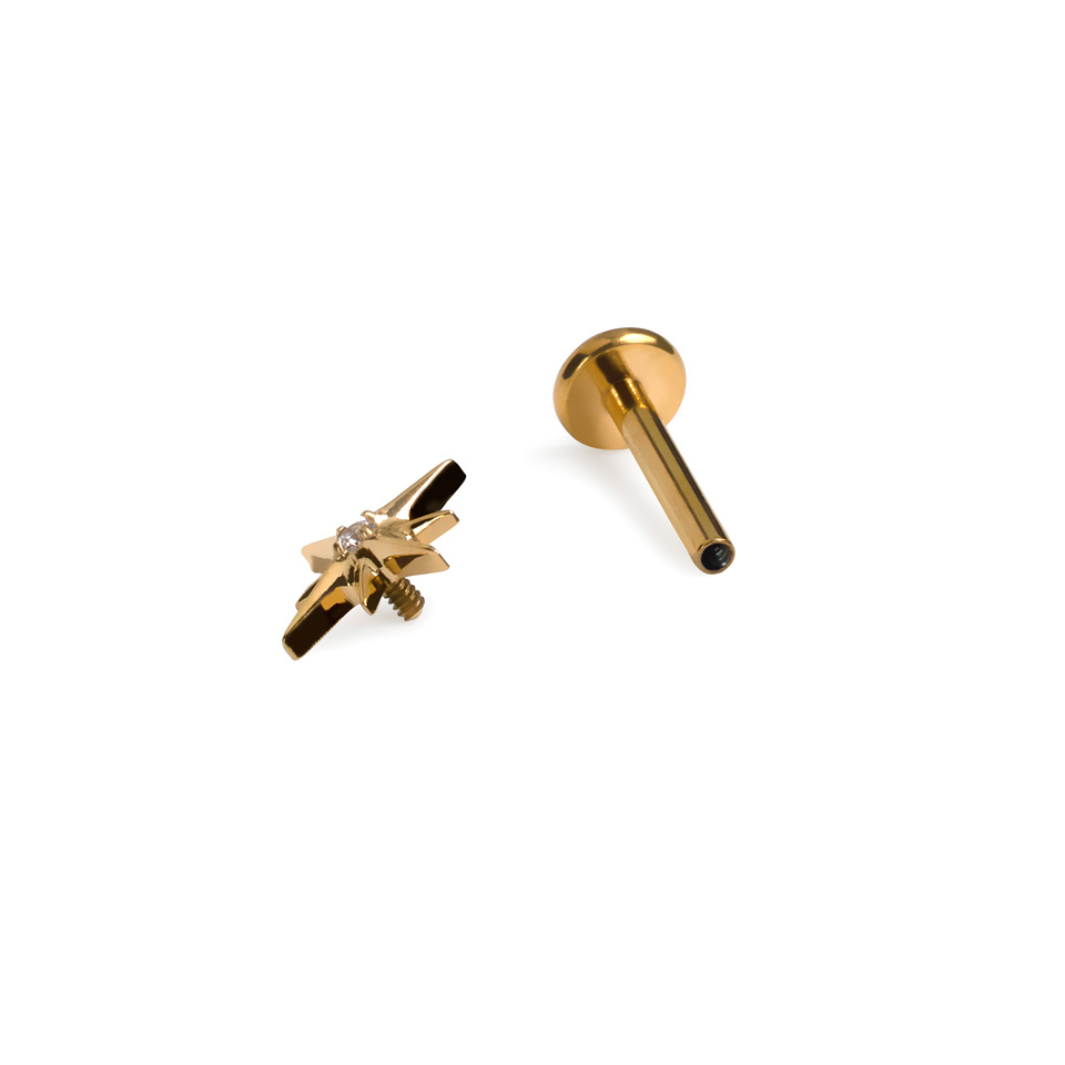 Tytanowy labret z gwiazdką i centralnym kamieniem