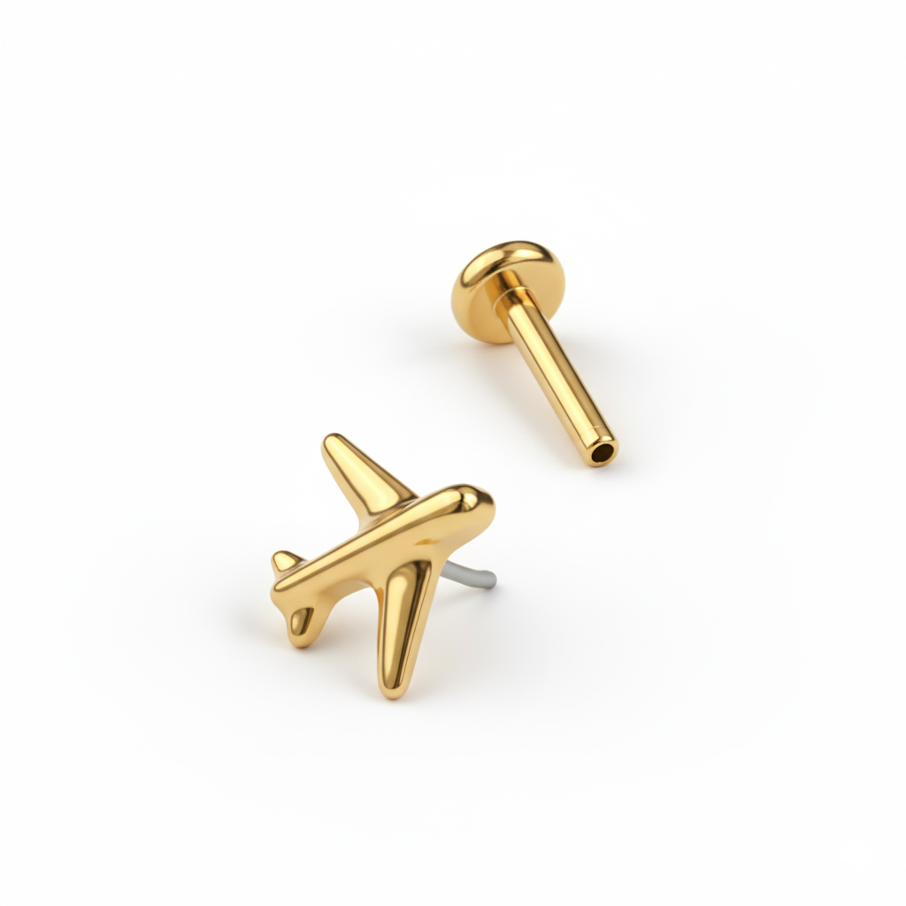 Tytanowy labret z samolotem