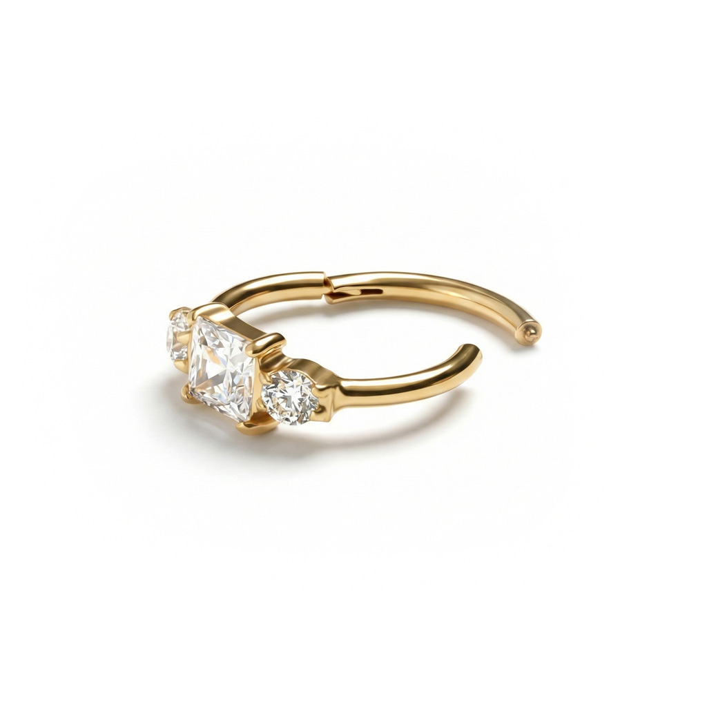 Kółko z tytanu zamykane zawiasem zdobione trzema cyrkoniami